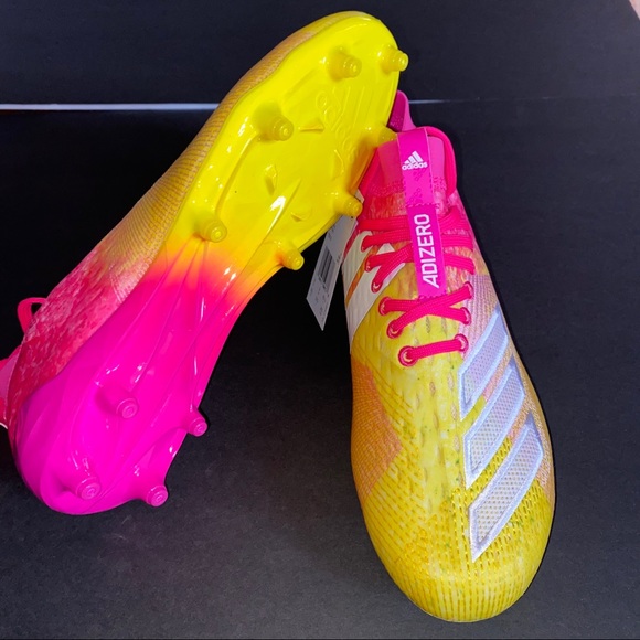 pink and yellow football cleats